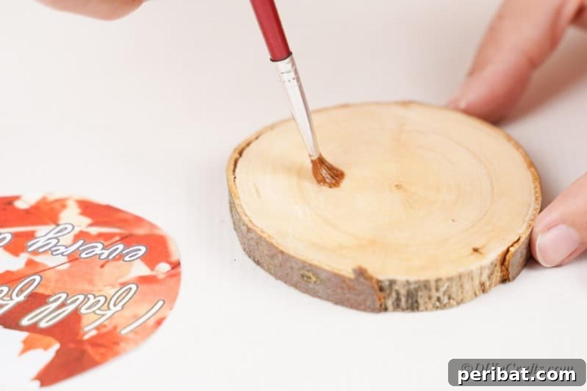 Autumnal Wood Slice Photo Keepsakes 10 Painting glue onto wood slice