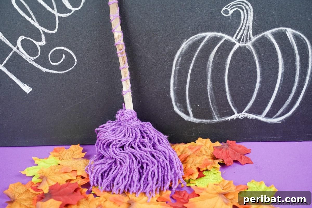 Bewitching DIY Broomstick Decor 4 Witch's broom against chalkboard