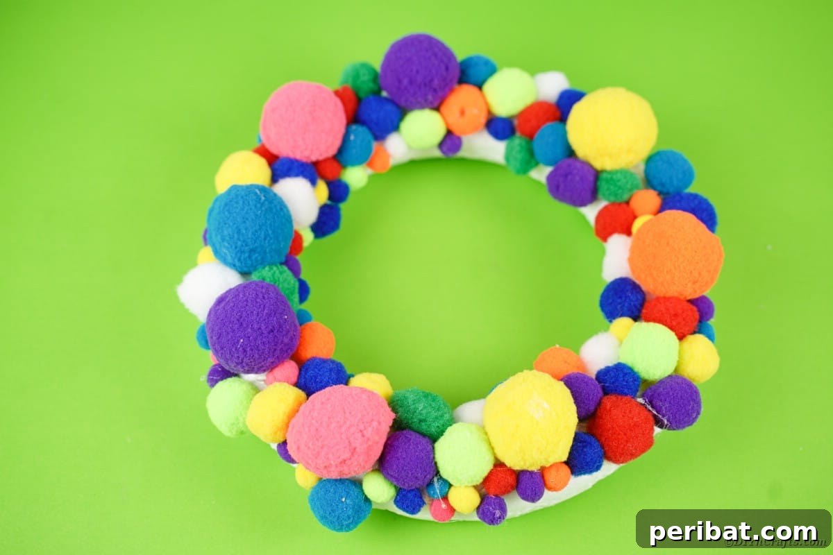 Creepy Cute Pom Pom Monster Wreath 6 Wreath form covered in pom poms