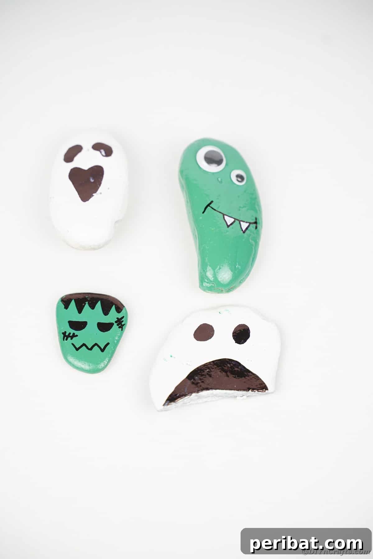 Spooky Sweet Halloween Rock Art 14 Painted rocks on white surface