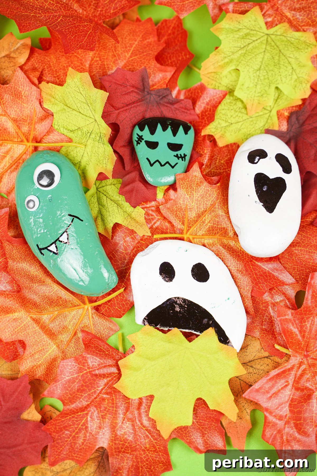 Spooky Sweet Halloween Rock Art 17 Painted rocks on fall leaves