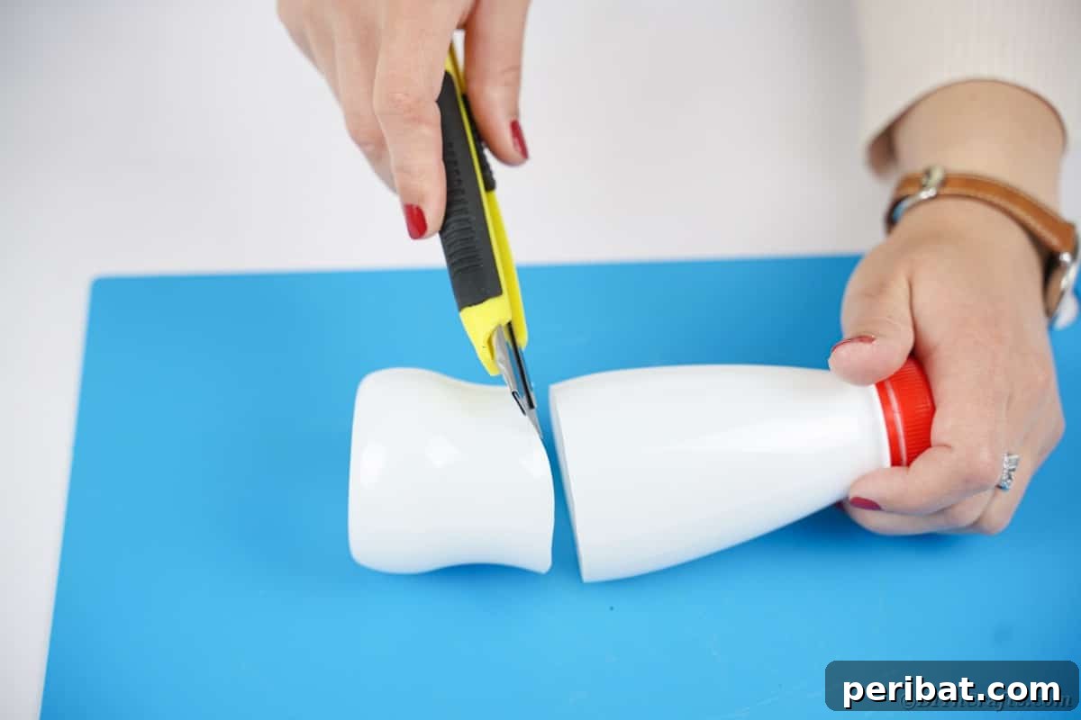 Charming Recycled Bottle Jack O Lantern 8 Craft knife cutting the bottom off a plastic bottle