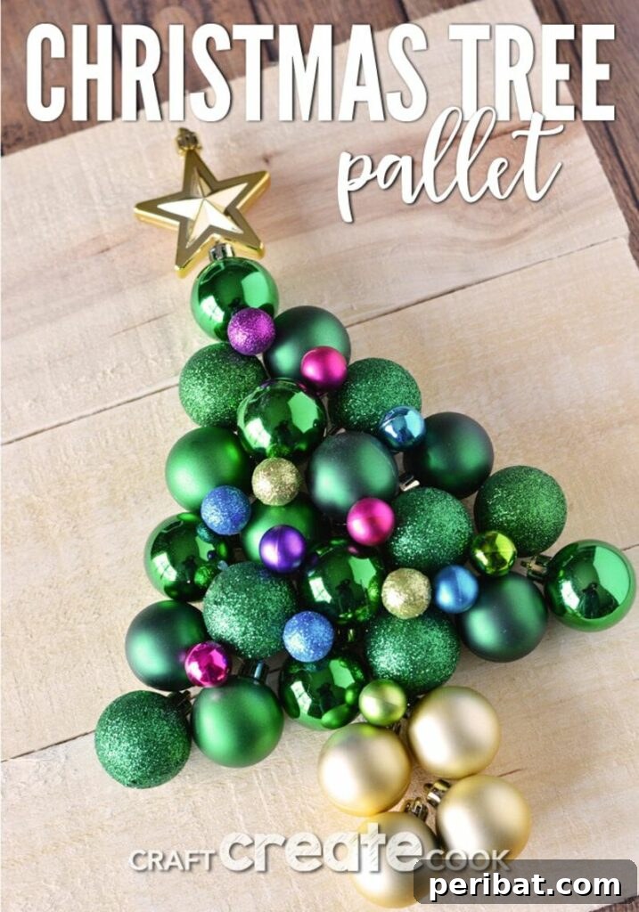 40+ Adorable Mini Christmas Tree Decor Ideas 18 Creative pallet ornament tree, a rustic DIY decoration for your holiday mantel or shelf.