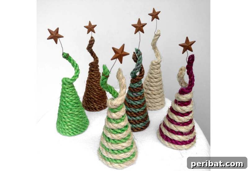 40+ Adorable Mini Christmas Tree Decor Ideas 20 A charming rustic rope Christmas tree adorned with colorful accents and a star, perfect for country-themed holiday decor.