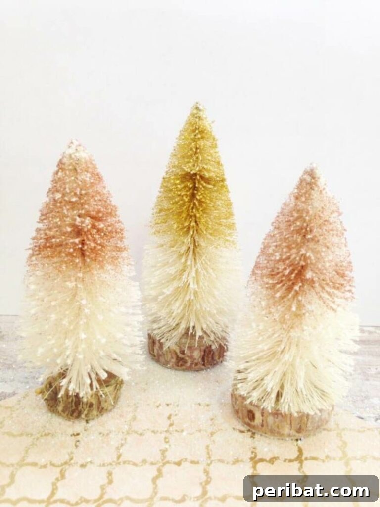 40+ Adorable Mini Christmas Tree Decor Ideas 22 Stylish Anthropologie-inspired ombre bottle brush Christmas trees, perfect for adding a vintage and retro touch to holiday decor.