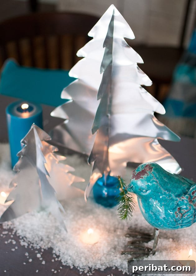 40+ Adorable Mini Christmas Tree Decor Ideas 41 Sparkling miniature aluminum Christmas trees, a brilliant and modern DIY idea for festive holiday decor.