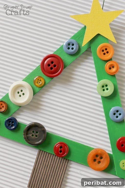 Delightful Christmas Popsicle Stick Creations for Kids 14 Colorful Craft Stick Button Christmas Tree Ornament on Paper
