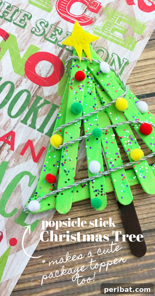 Delightful Christmas Popsicle Stick Creations for Kids 20 3D Popsicle Stick Christmas Tree Ornament with Ribbon and Pom-Poms