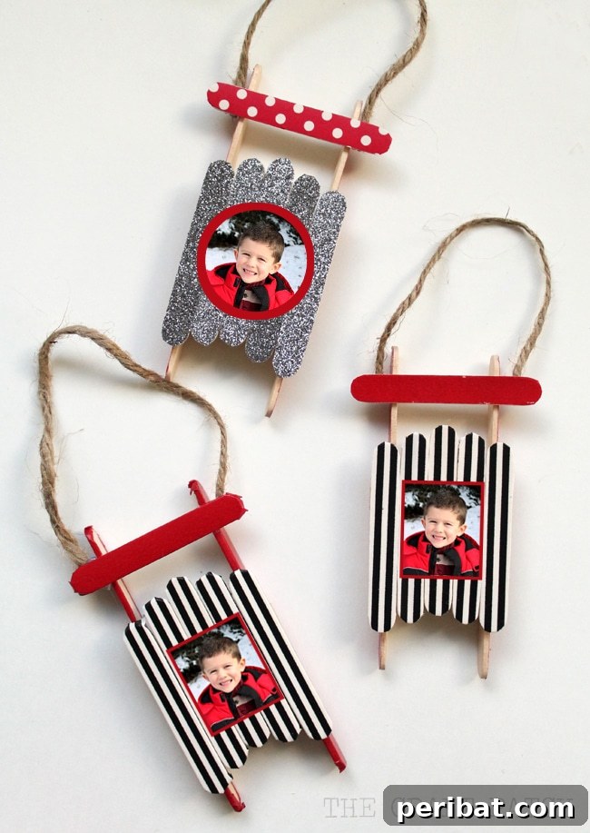 Delightful Christmas Popsicle Stick Creations for Kids 22 Collection of Photo Sled Christmas Ornaments on a Table
