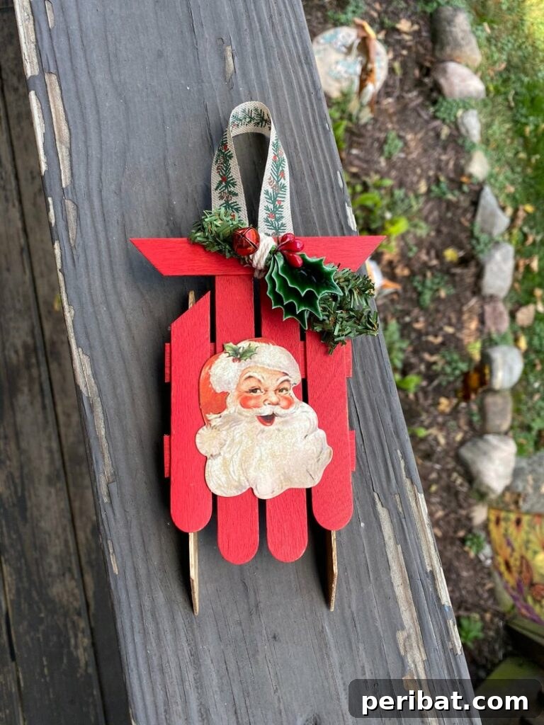 Delightful Christmas Popsicle Stick Creations for Kids 29 Rustic Vintage Santa Claus Christmas Sled Ornament on a Wooden Board