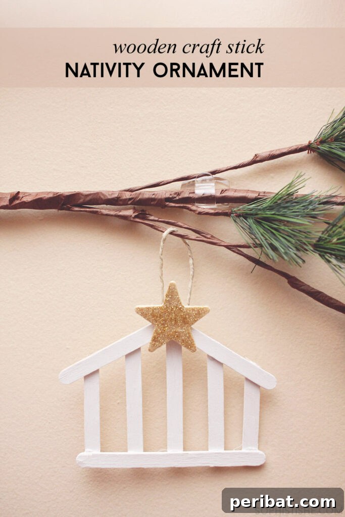 Delightful Christmas Popsicle Stick Creations for Kids 31 Simple Craft Stick Nativity Ornament Hanging on a Christmas Branch