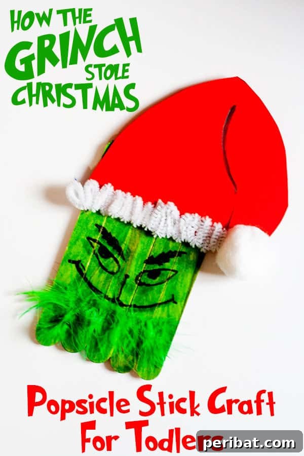 Delightful Christmas Popsicle Stick Creations for Kids 32 Whimsical Grinch Popsicle Stick Craft Character on a Table