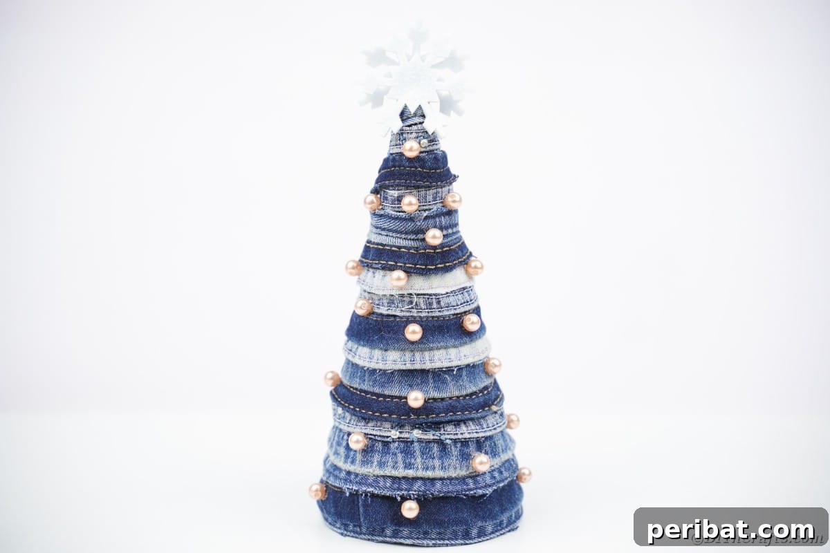 Upcycled Denim Mini Christmas Tree 7 Old blue jean Christmas tree on white background