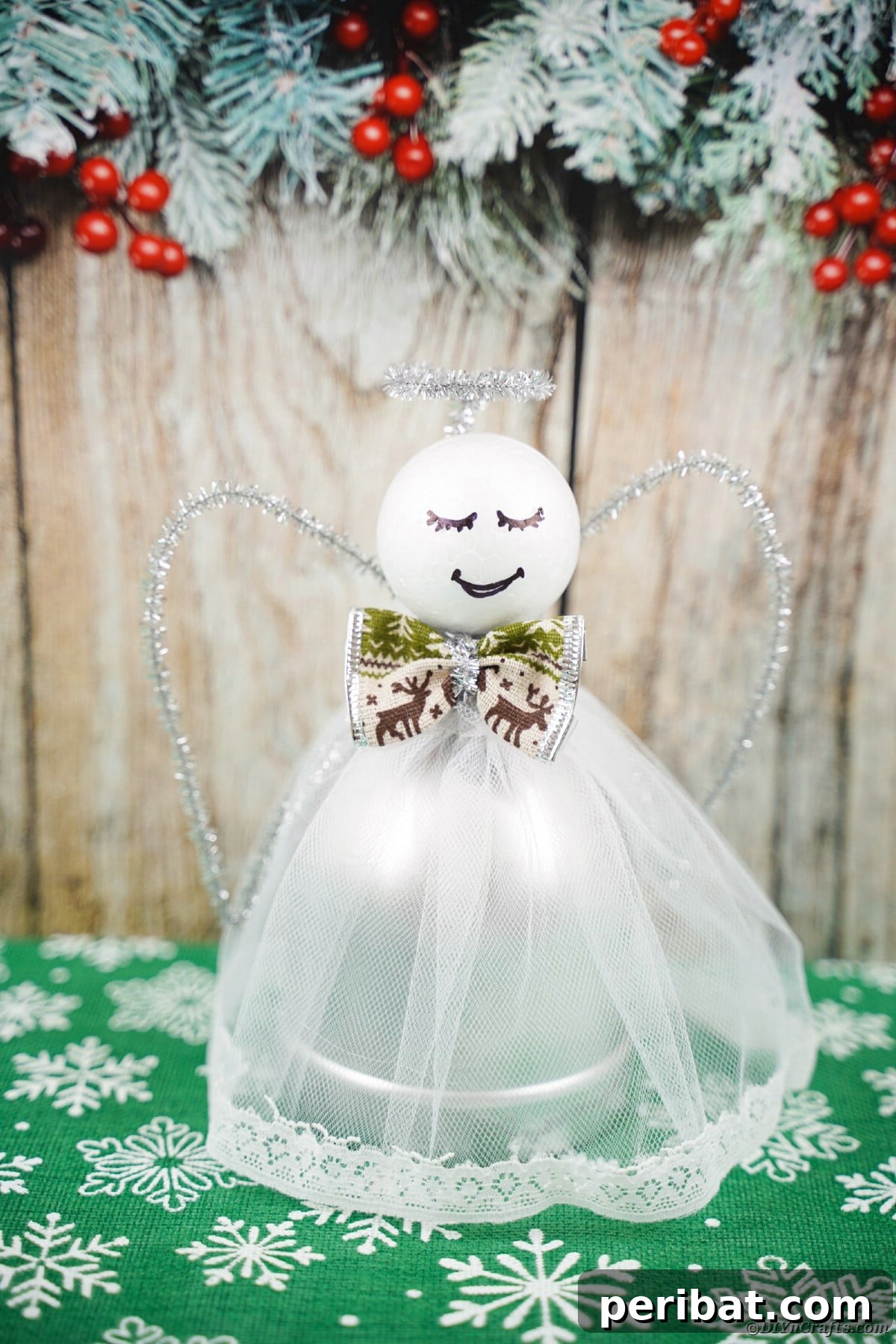 Enchanting Upcycled Bottle Angel Ornament 12 Bottle angel against boards, showing how different skirt colors can create unique looks.