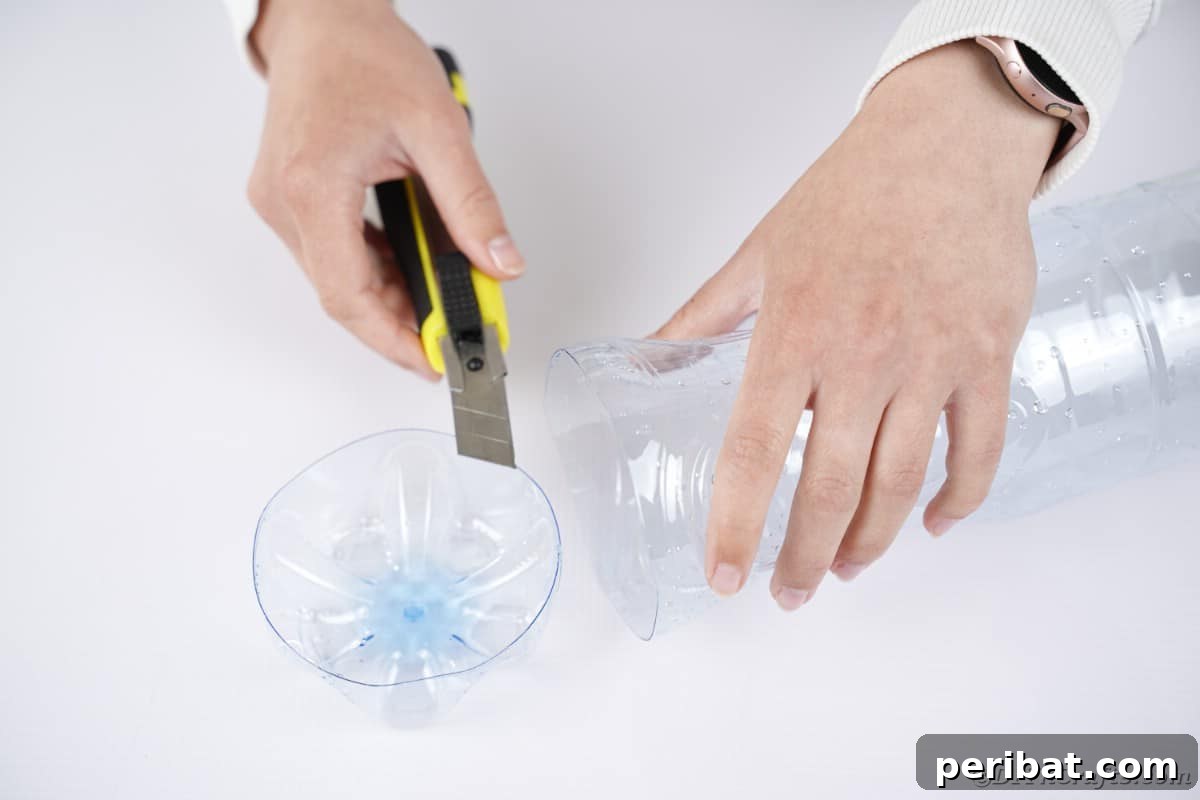 Bottle to Bauble: Stunning Upcycled Snowflakes 8 Cutting bottom of bottle