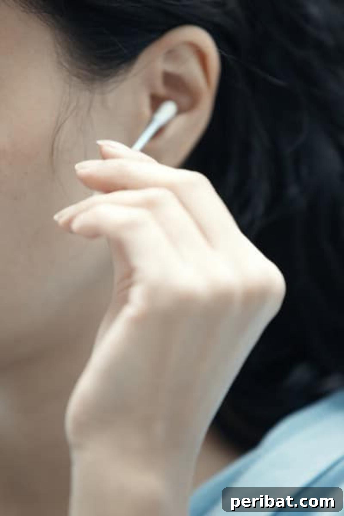 51 Genius Hydrogen Peroxide Hacks 10 A woman is cleaning her ear