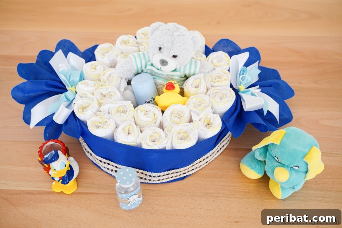 A beautifully crafted candy diaper cake sits on a rustic wood table, adorned with ribbons and ready for gifting.