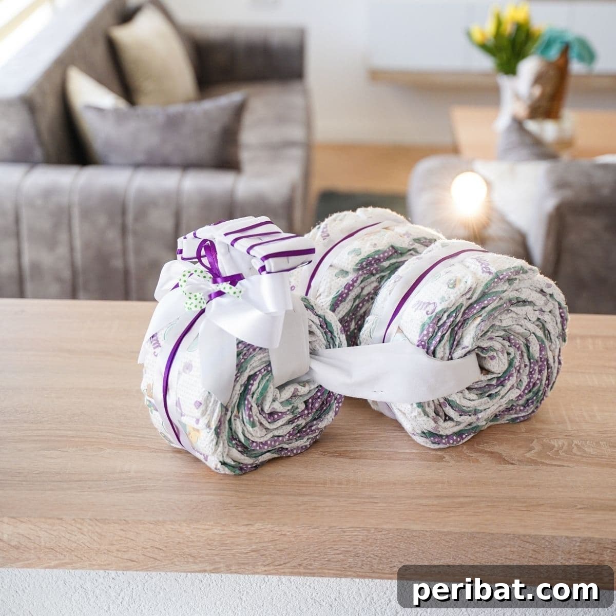 Diaper tricycle on table, ready for a baby shower