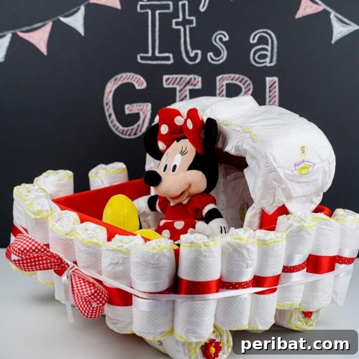 Diaper cake bassinet by chalkboard, a perfect handmade baby shower gift idea.