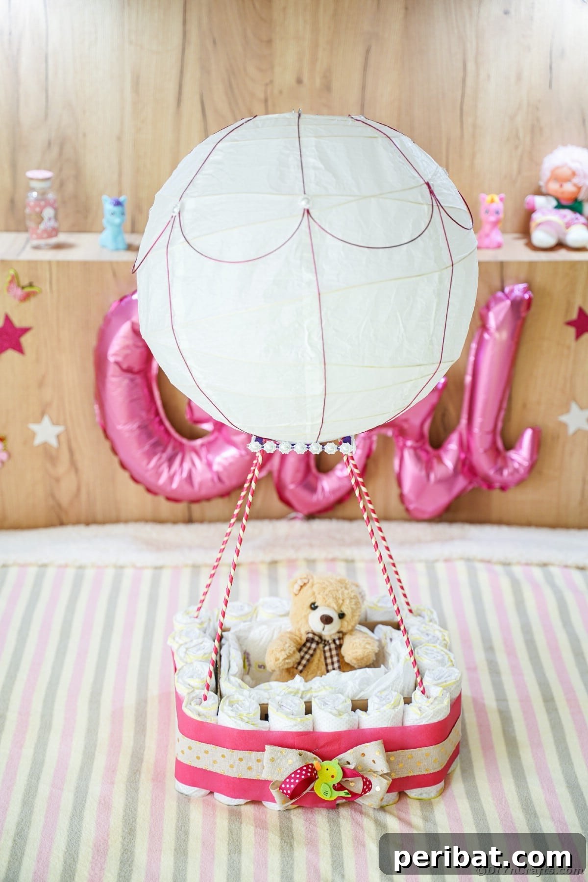 Whimsical Hot Air Balloon Diaper Cake 32 Diaper cake air balloon on bed