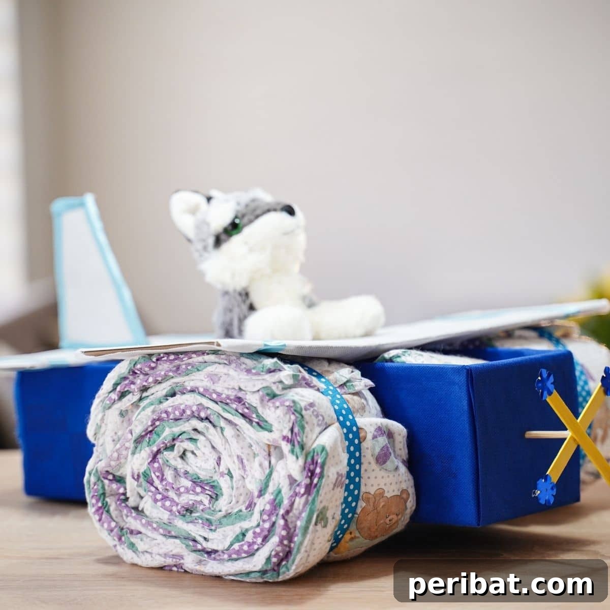 Cloud Nine Diaper Plane Baby Shower Gift 2 Airplane diaper cake on table