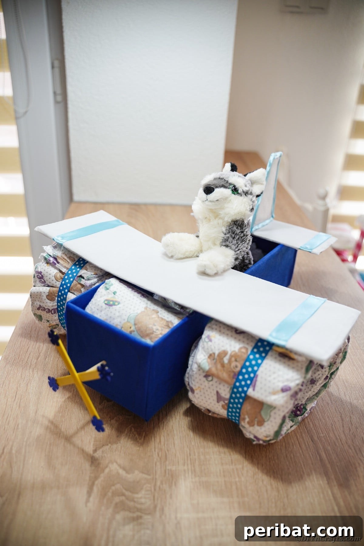 Cloud Nine Diaper Plane Baby Shower Gift 27 Airplane diaper cake on table