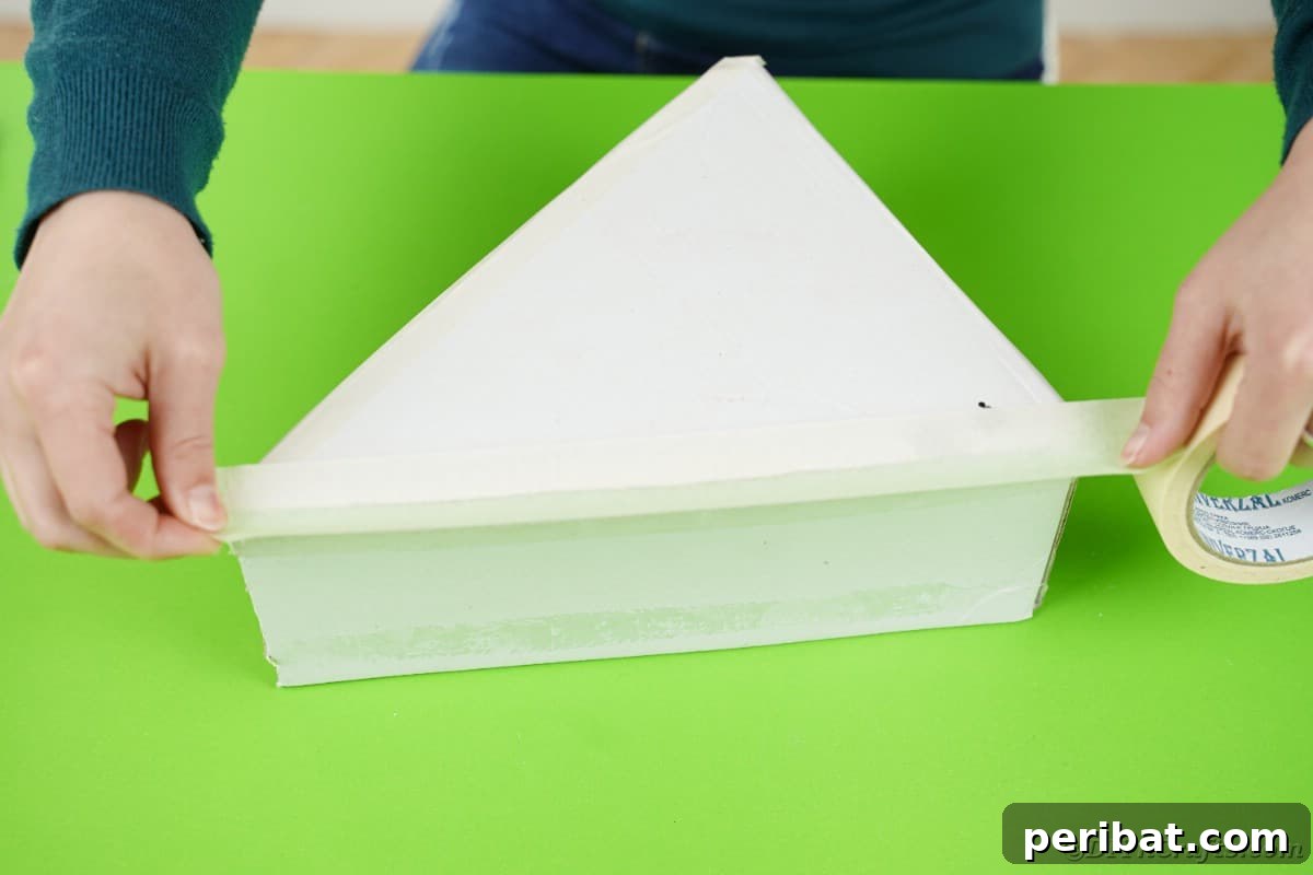 Adding tape to box