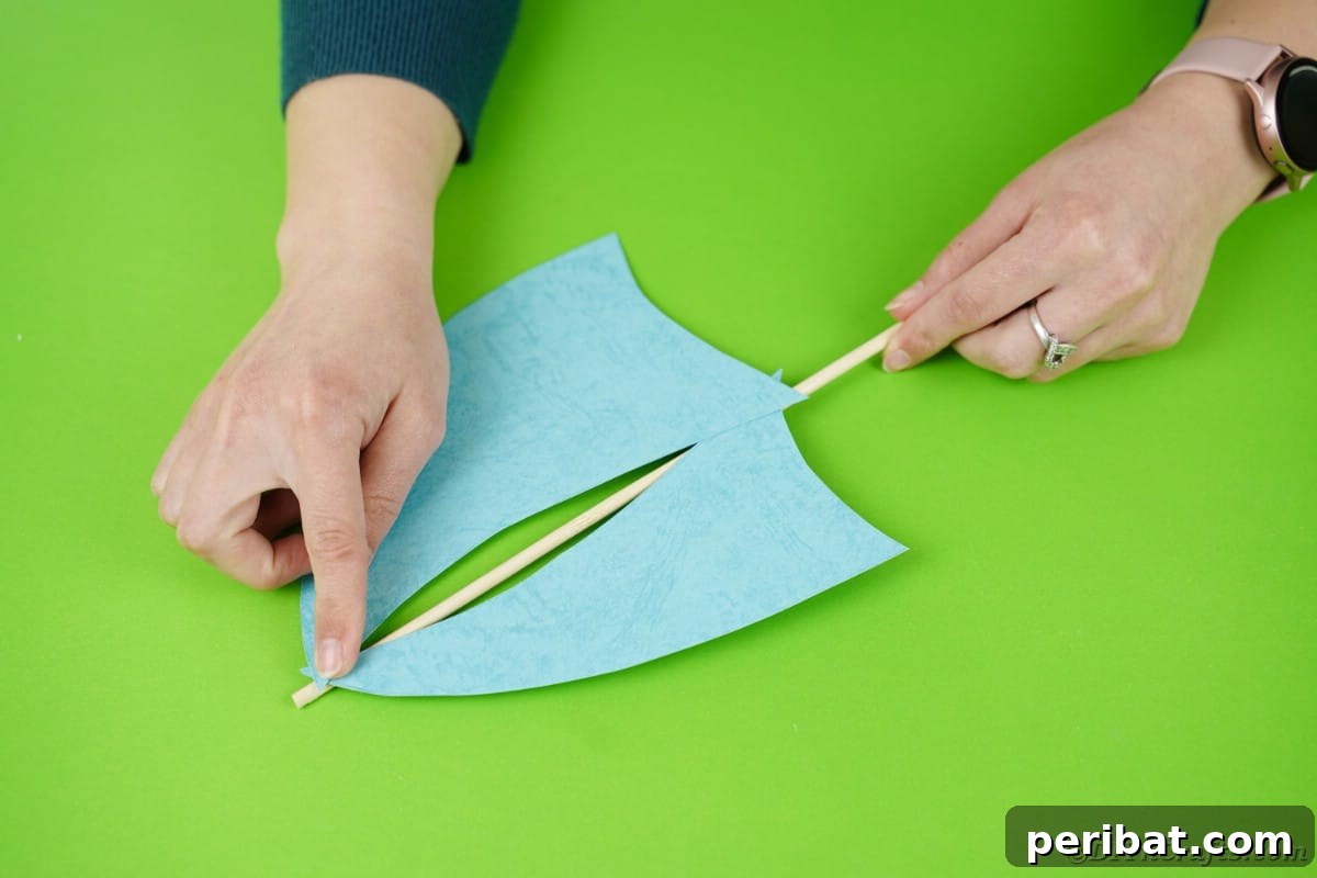 Gluing sails on dowel