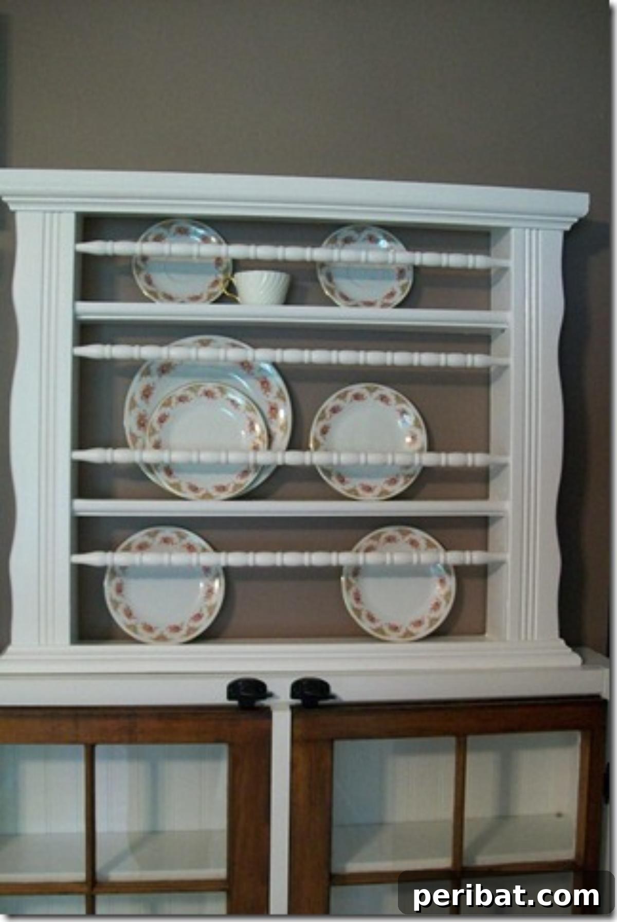 Transform Your Old Crib: 20 Clever Upcycling Projects 16 Repurposed Crib Side Plate Rack for Decorative Display