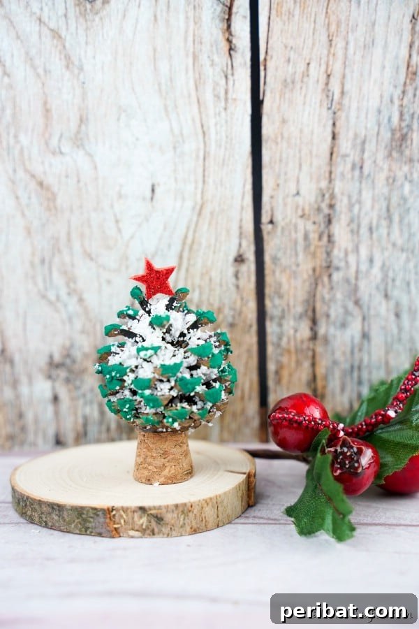 40 Christmas Craft Ideas to Spark Kids' Creativity This Winter Break 11 An enchanting pine cone mini Christmas tree craft, painted and propped on an old wine bottle cork, perfect for holiday decor.