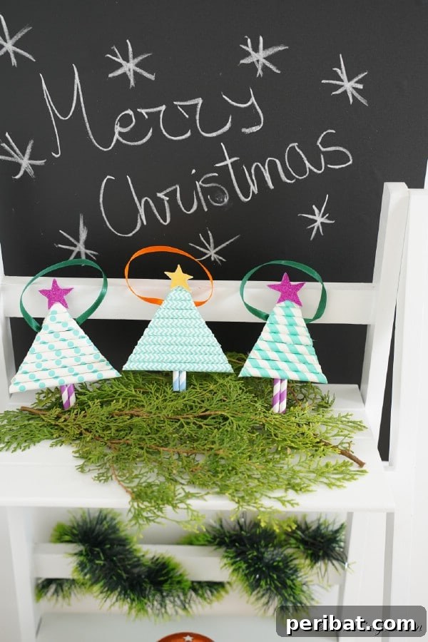 40 Christmas Craft Ideas to Spark Kids' Creativity This Winter Break 16 A whimsical paper straw mini Christmas tree ornament, crafted from colorful paper straws and adorned with festive details.