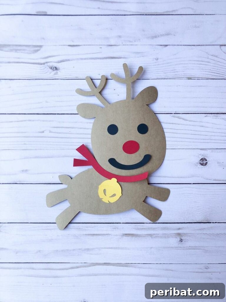 40 Christmas Craft Ideas to Spark Kids' Creativity This Winter Break 27 An easy pre-cut paper reindeer kids' craft, assembled on a table, perfect for group activities and quick assembly.
