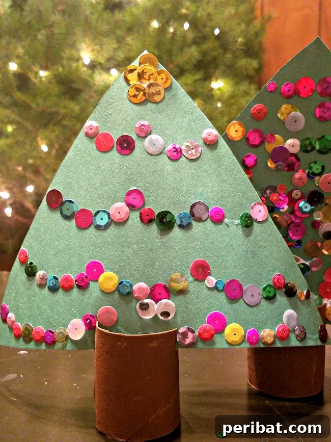 40 Christmas Craft Ideas to Spark Kids' Creativity This Winter Break 28 A simple and fun Christmas tree craft made from paper and basic materials, suitable for all ages and budget-friendly.