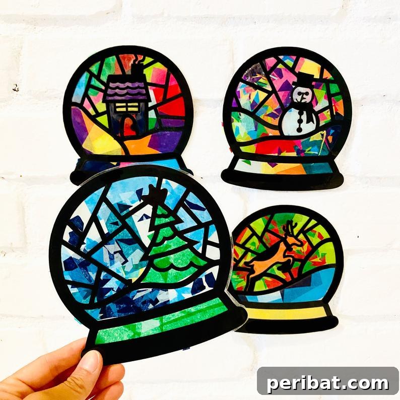 40 Christmas Craft Ideas to Spark Kids' Creativity This Winter Break 35 A collection of sparkling snowglobe sun catcher crafts for kids, perfect for customizing and hanging in a window.