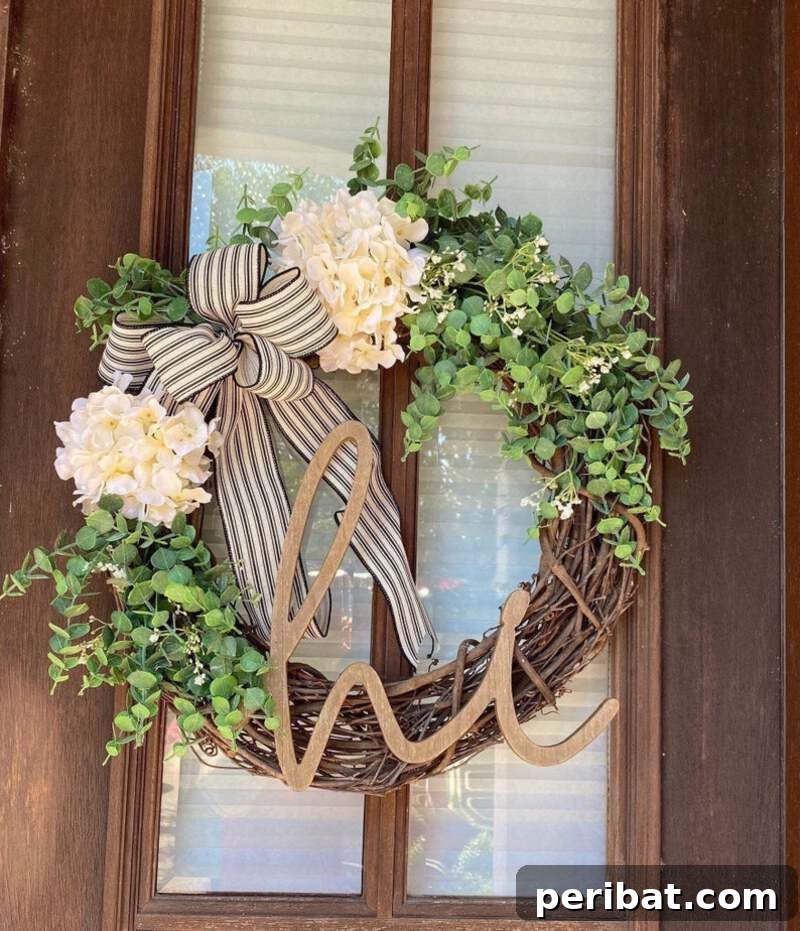 Rustic Farmhouse Wreaths for Year-Round Beauty 13 Farmhouse 'Hi' wreath featuring a wooden message, ribbon, greenery, and flowers