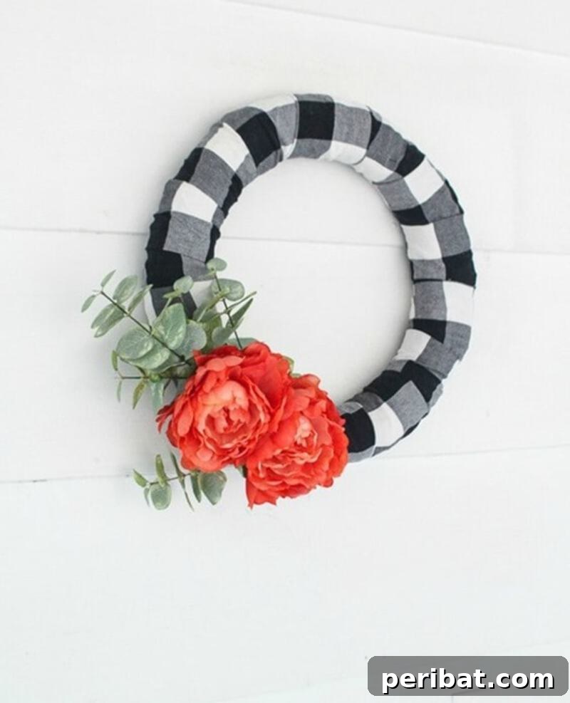 Rustic Farmhouse Wreaths for Year-Round Beauty 30 Buffalo plaid wreath made from an old shirt and flowers