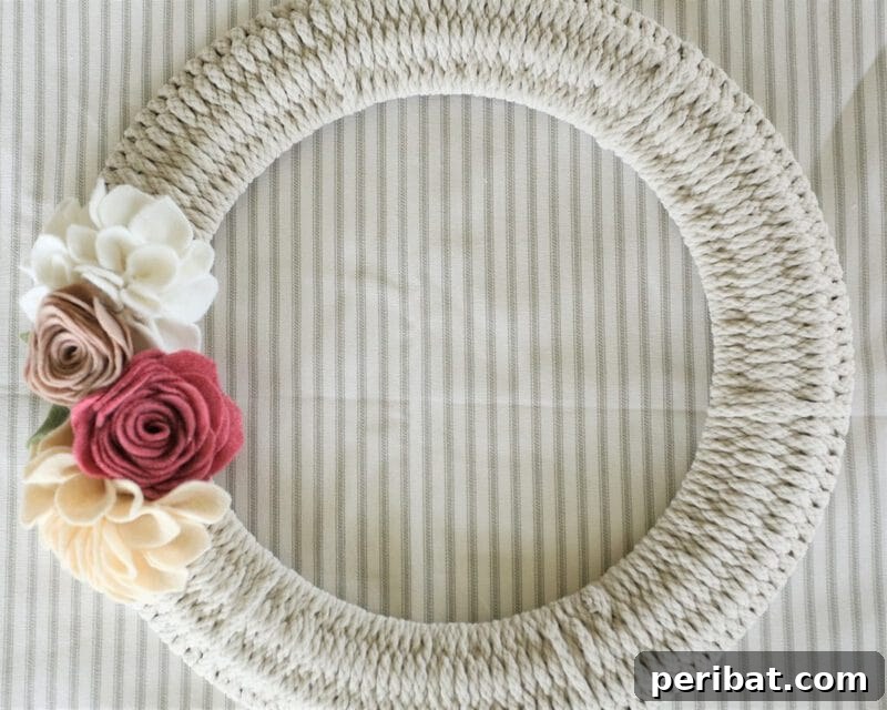 Rustic Farmhouse Wreaths for Year-Round Beauty 32 Rope-wrapped wreath with a simple, clean aesthetic