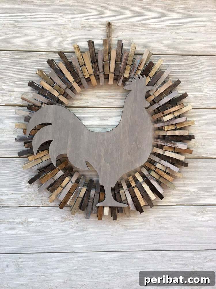 Rustic Farmhouse Wreaths for Year-Round Beauty 37 Clothespin wreath with a weathered look and a rooster accent