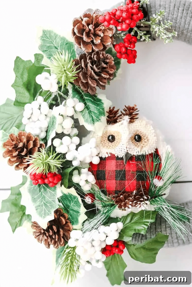 Rustic Farmhouse Wreaths for Year-Round Beauty 9 Farmhouse wreath with an upcycled sweater and a decorative owl accent