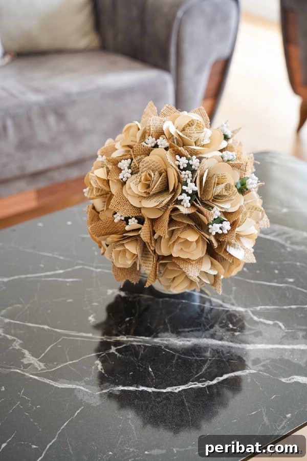 Beyond the Covers: Old Book Craft and Decor Inspiration 7 Paper rose wall on table