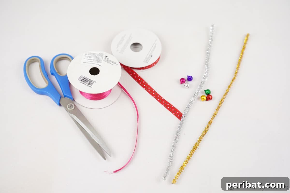 Whimsical Pipe Cleaner Jingle Bell Ornaments for Kids 7 Various craft supplies laid out on a table, including pipe cleaners, bells, and ribbons