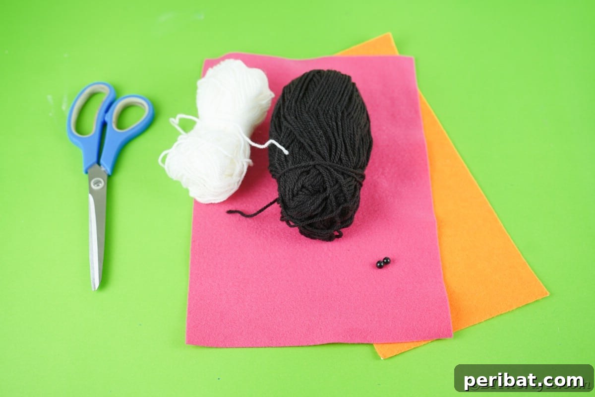 Handmade Pom Pom Penguin Winter Charm 8 Collection of craft supplies for making pom pom penguins