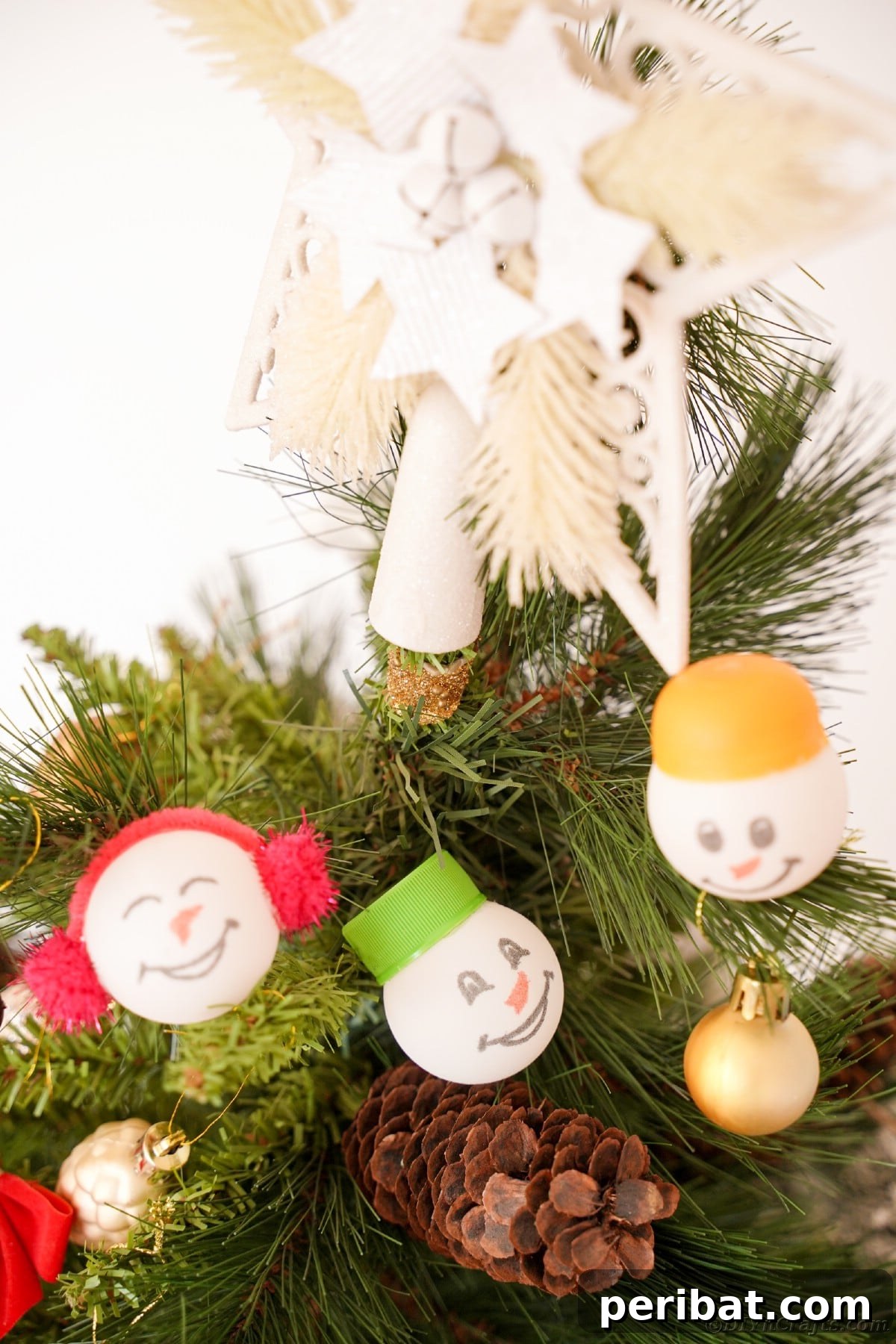 Handcrafted Ping Pong Snowman Holiday Ornaments 14 Ping pong snowman face on tree