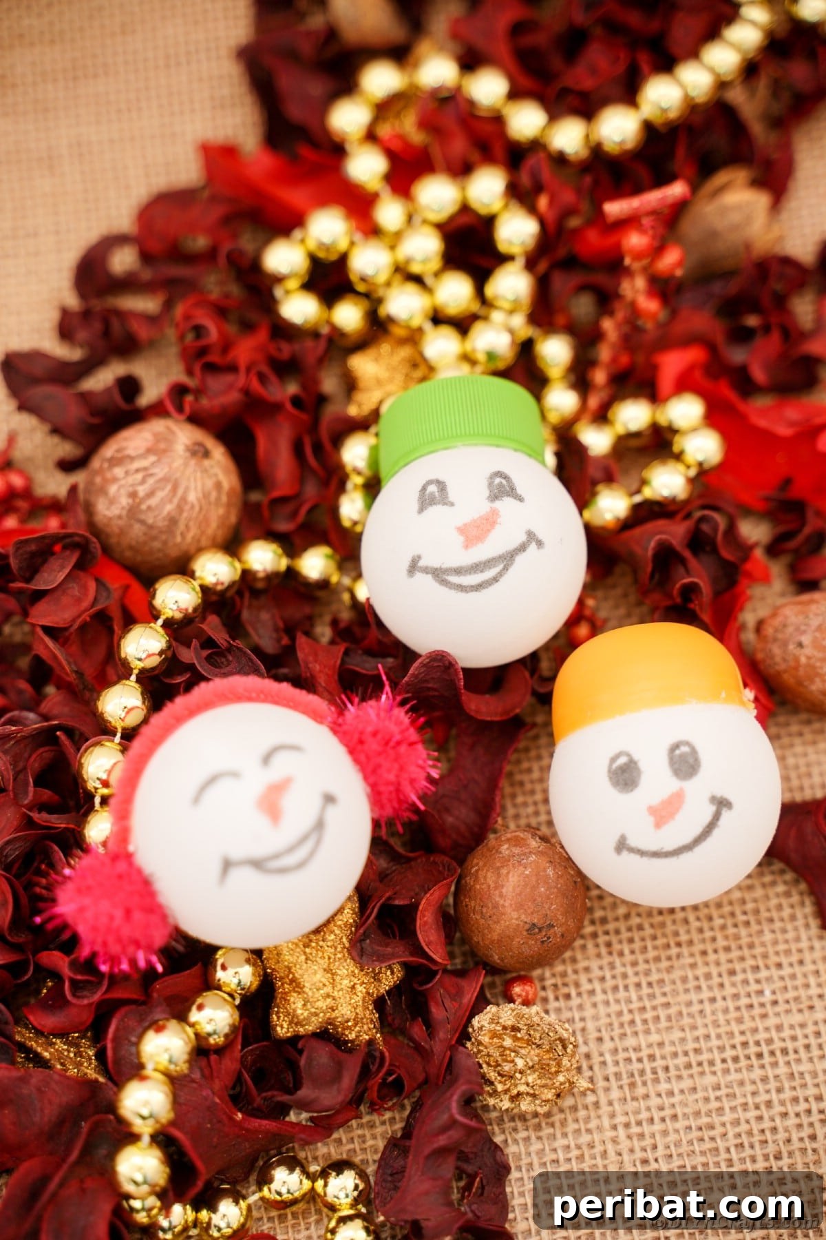 Handcrafted Ping Pong Snowman Holiday Ornaments 15 Ping pong ball ornaments on table