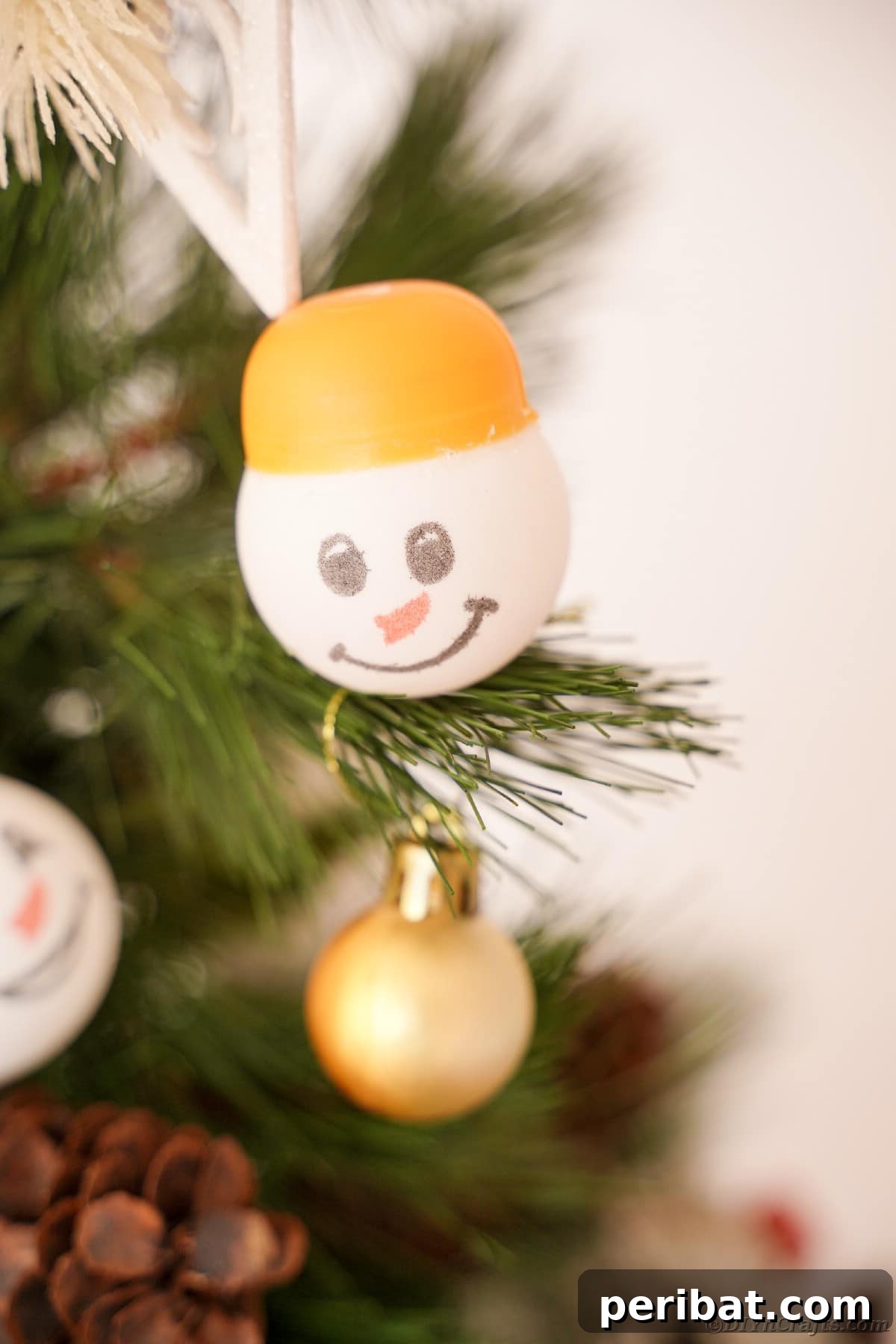 Handcrafted Ping Pong Snowman Holiday Ornaments 17 Ping pong snowman face on tree