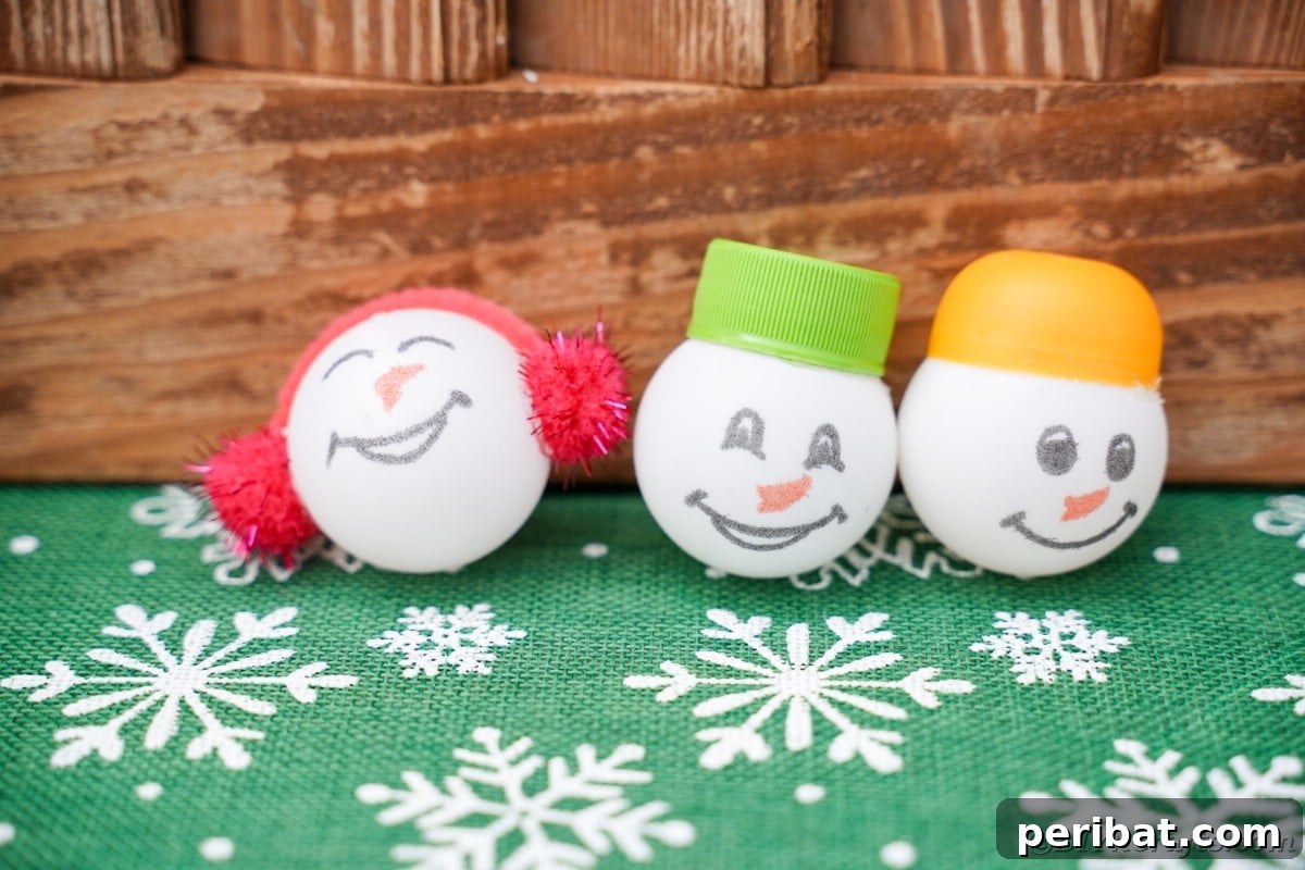 Handcrafted Ping Pong Snowman Holiday Ornaments 6 Ornaments by wooden wall