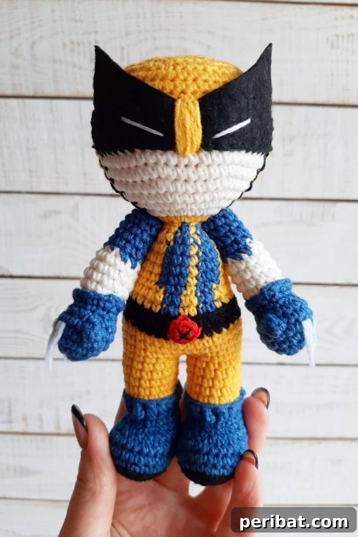 A charming crocheted Wolverine superhero doll, a fun gift for comic book enthusiasts.