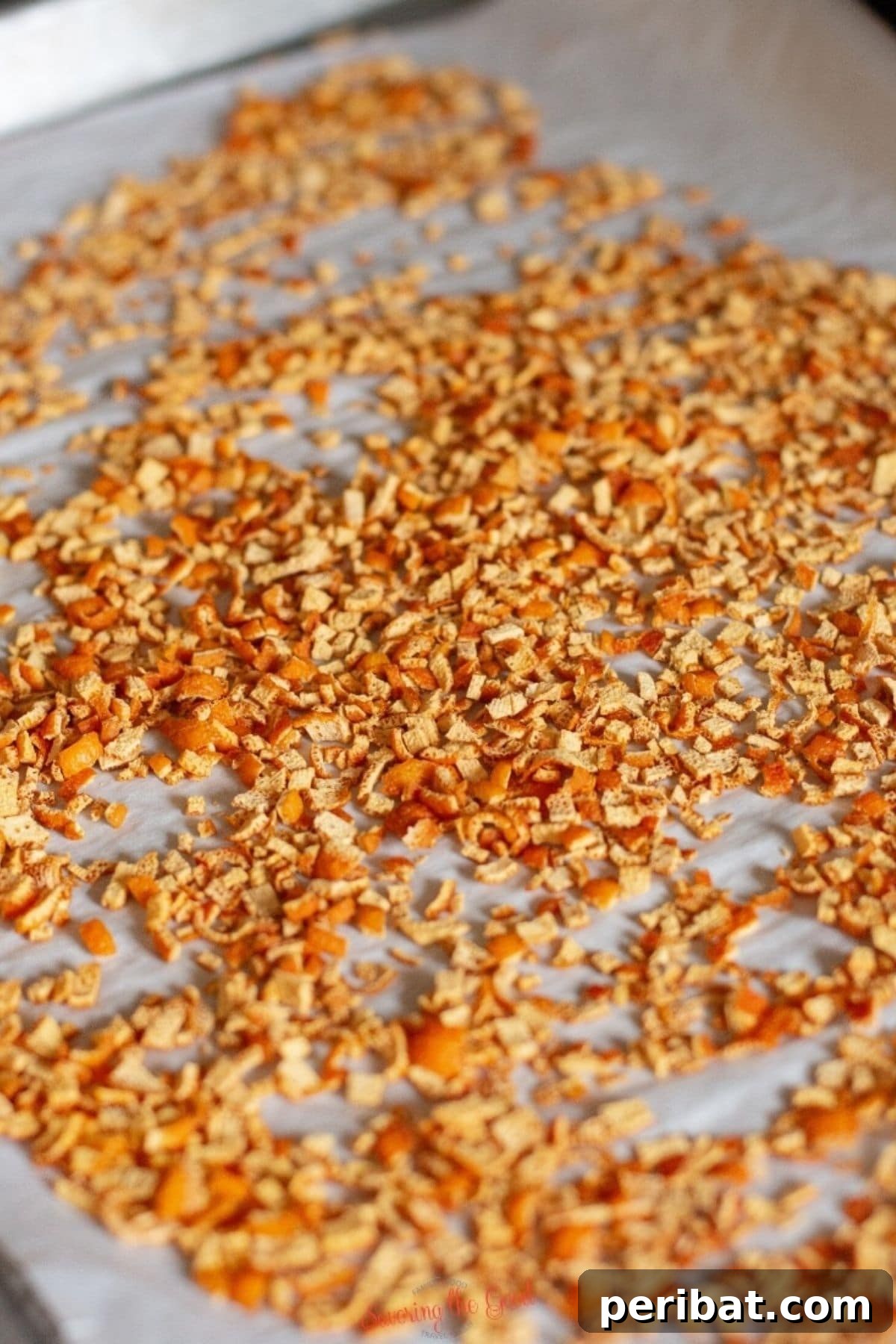 Dried orange peel pieces in a glass jar