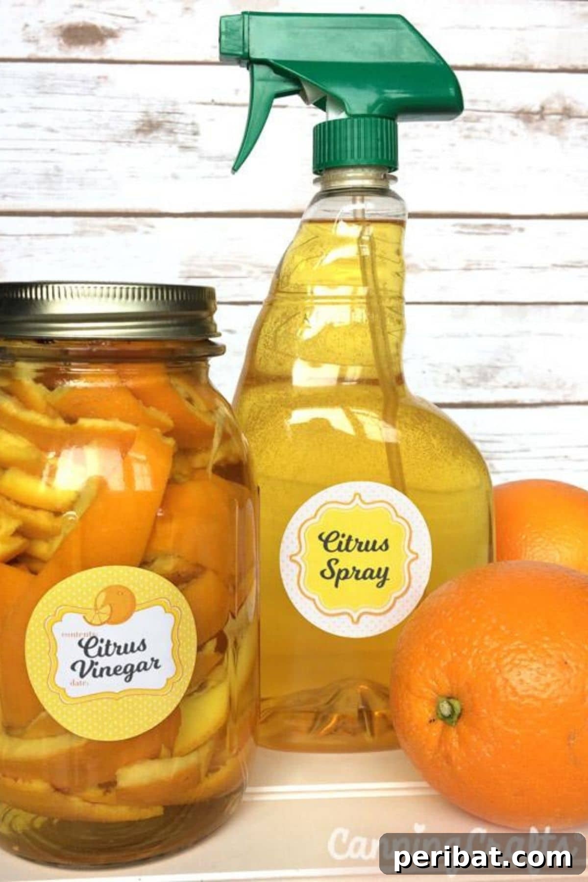 Orange peel infused vinegar spray in a bottle