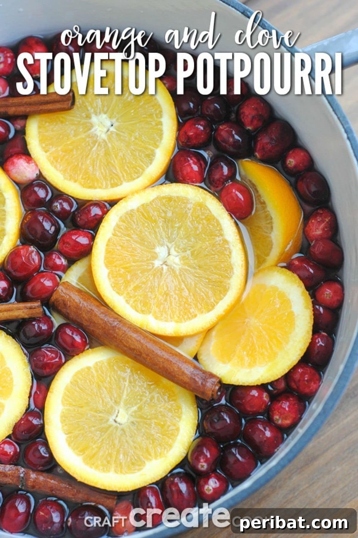 Stovetop potpourri simmering with orange slices and spices